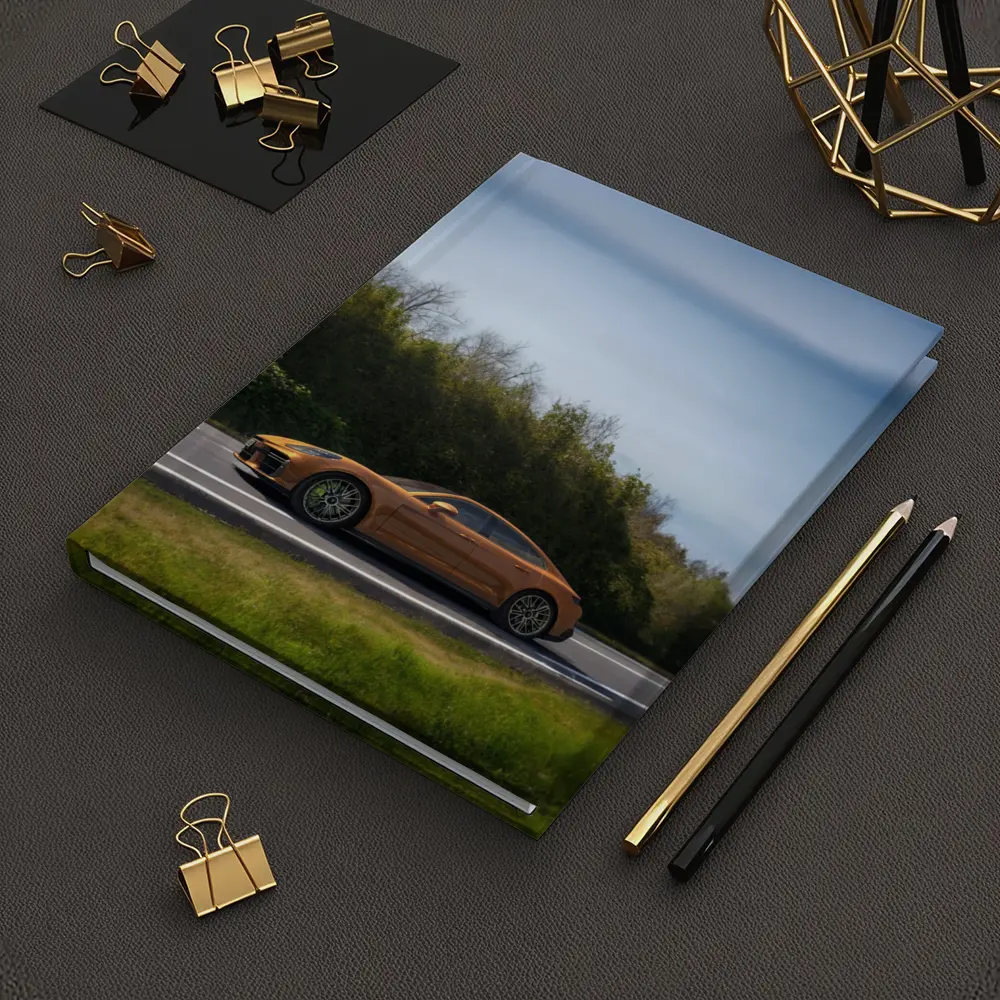 Porsche Panamera Orange on Open Road – Notebooks