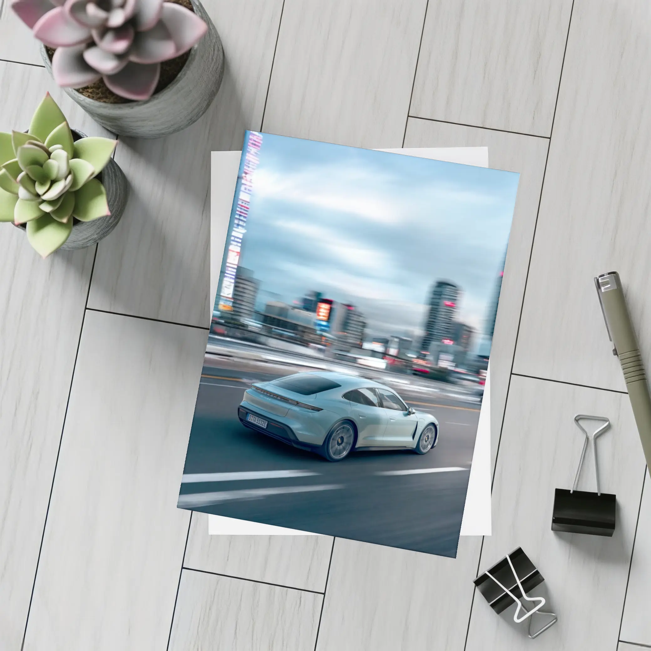 Porsche Taycan Speeding Through City Streets – Postcards