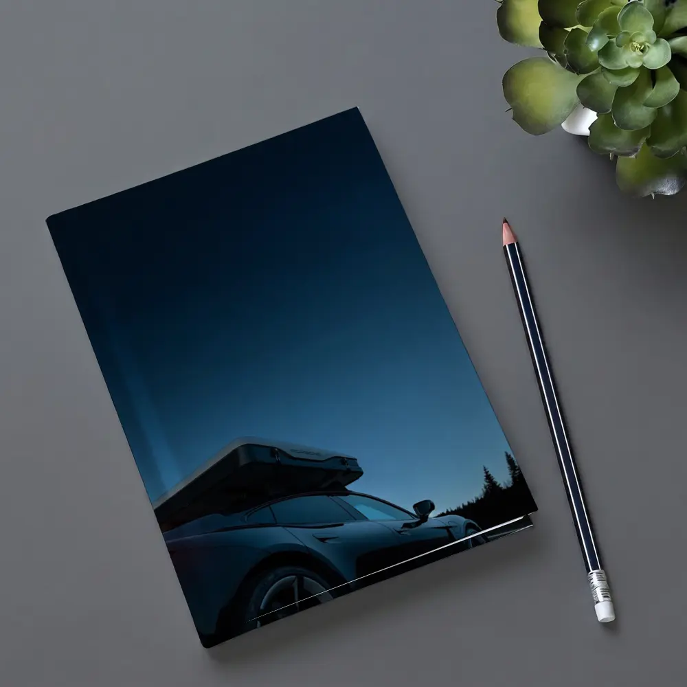 Porsche Taycan With Roof Box At Dusk – Notebooks