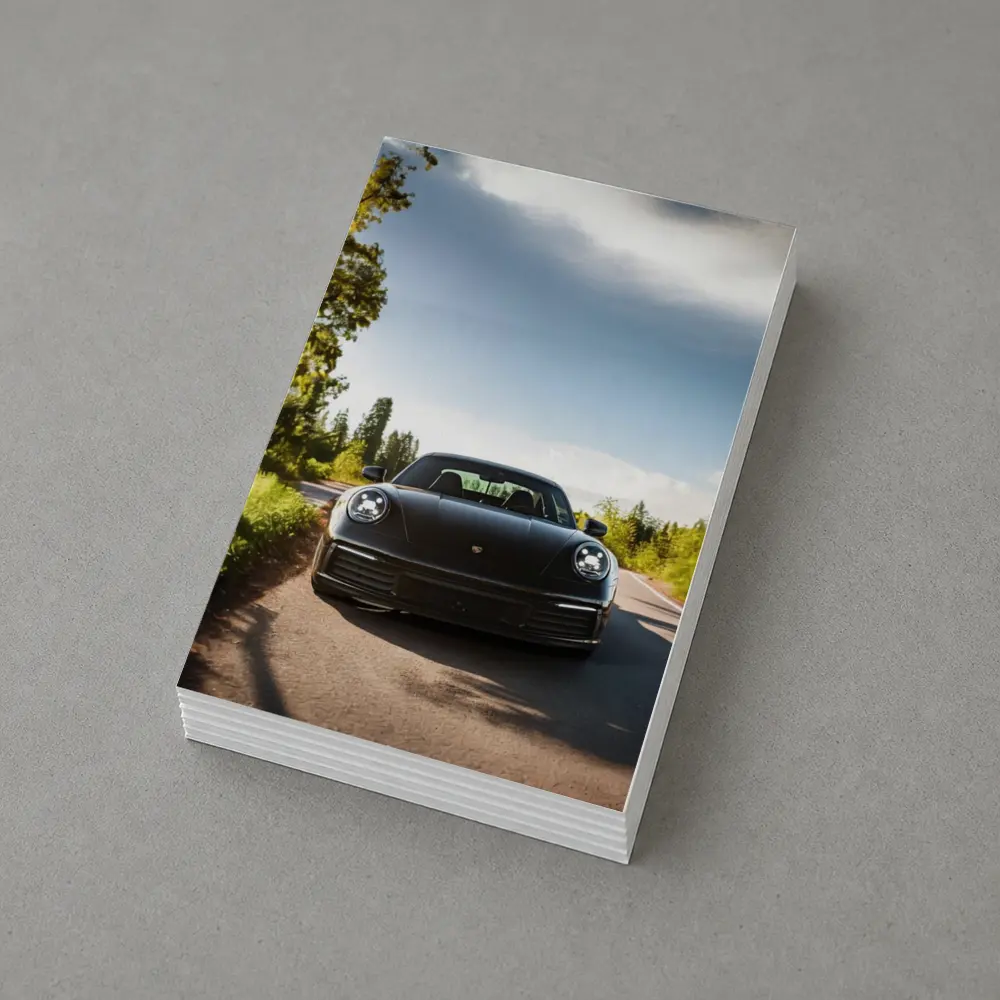 Black Porsche 911 On Tree Lined Road – Postcards