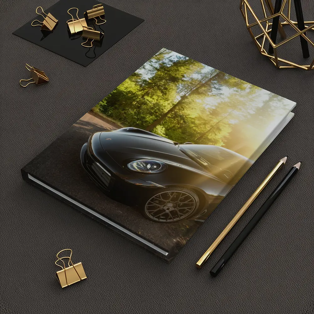Black Porsche 911 Parked in Sunlit Forest – Notebooks
