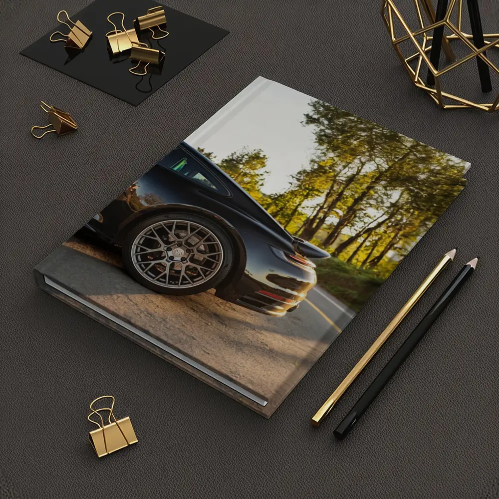 Black Porsche 911 On Scenic Forest Road – Notebooks