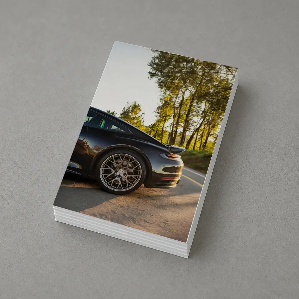 Black Porsche 911 On Scenic Forest Road – Postcards