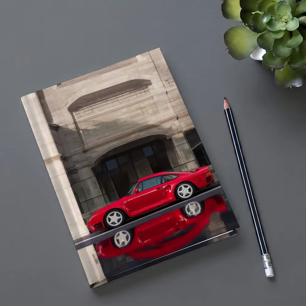 Porsche 959 Red Classic Against Stone Building – Notebooks