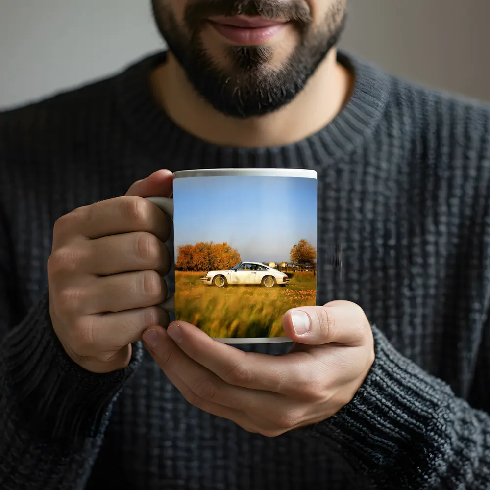 White Porsche 911 Parked in Autumn Field – Mugs