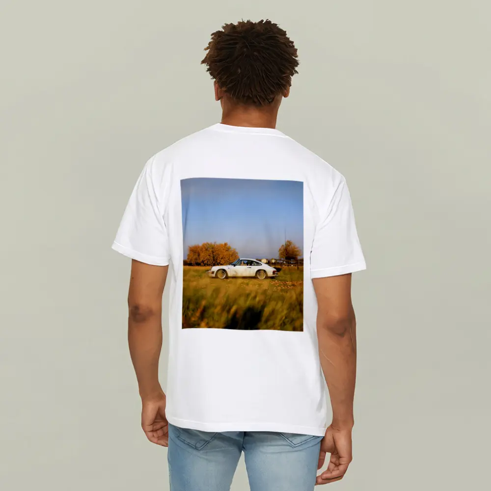 White Porsche 911 Parked in Autumn Field – T-Shirts