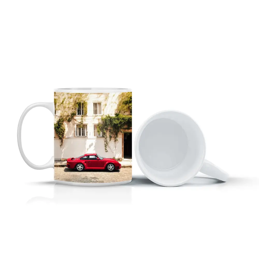 Red Porsche 959 Parked Old Town Street – Mugs