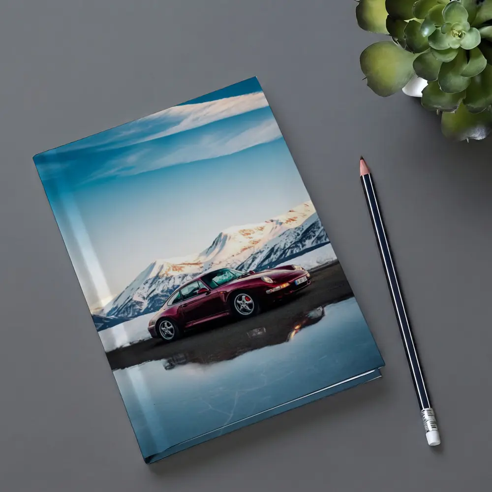 Porsche 911 Dark Red Snowy Mountain Backdrop – Notebooks