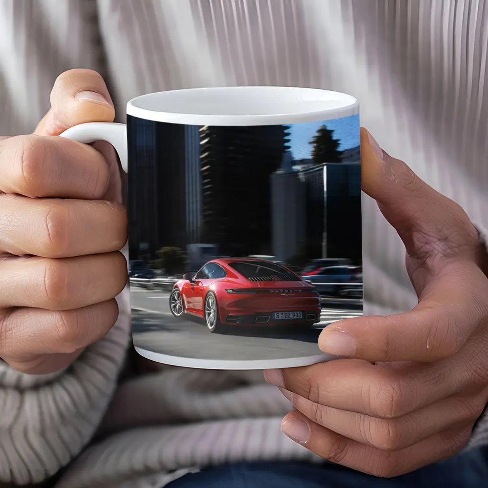 Red Porsche 911 Driving Through City Streets – Mugs