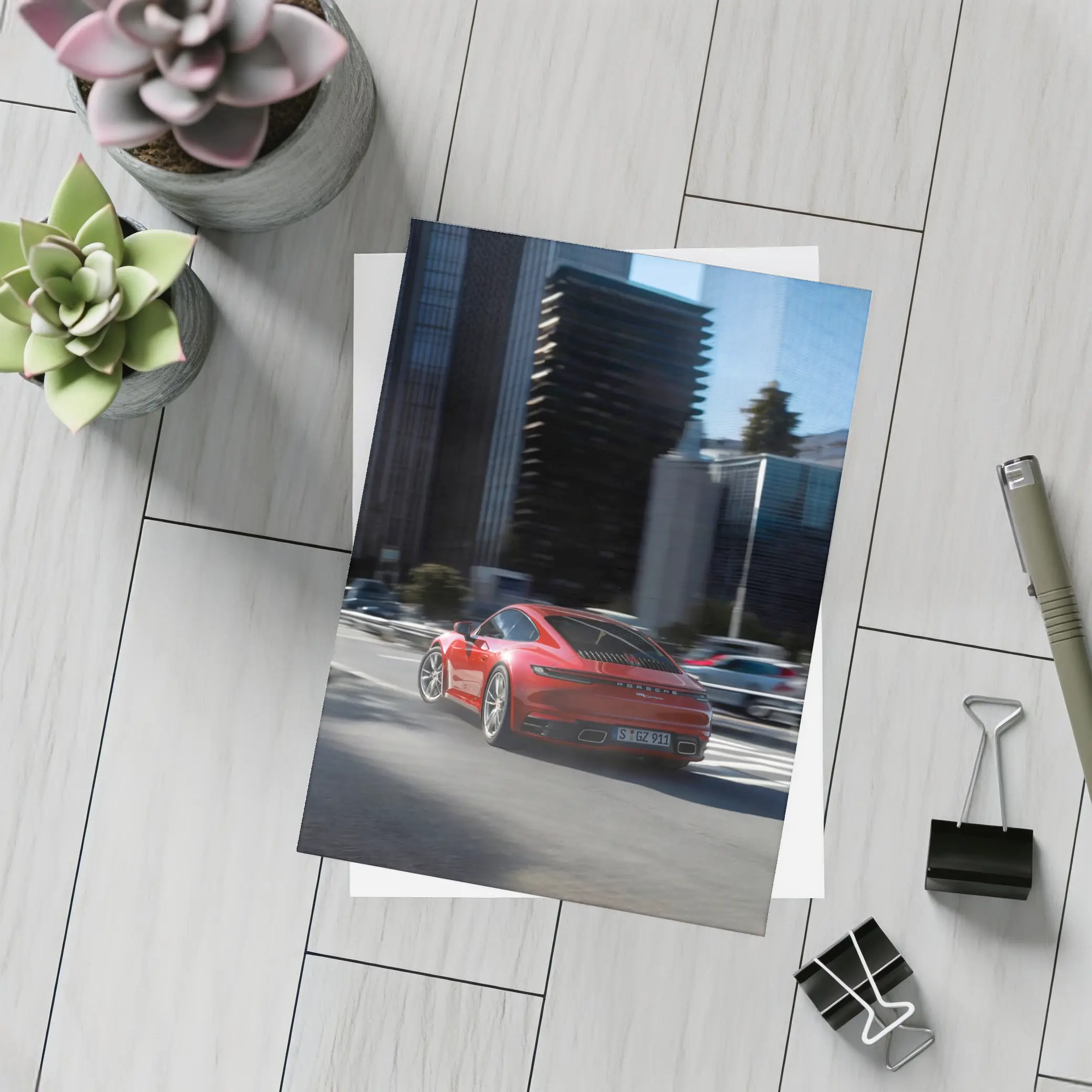 Red Porsche 911 Driving Through City Streets – Postcards