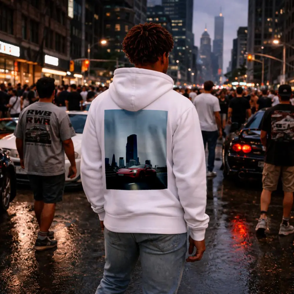 Red Porsche Taycan Driving Through City Skyline – Hoodies