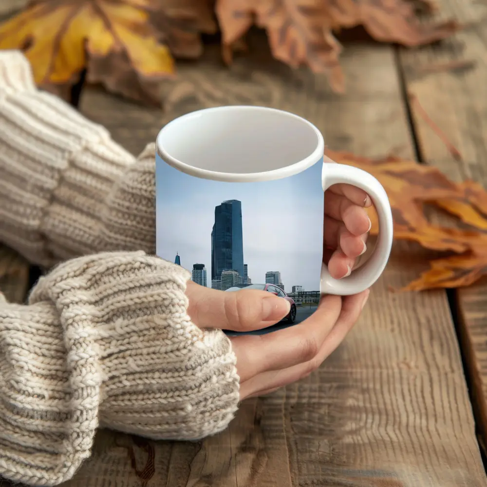Red Porsche Taycan Driving Through City Skyline – Mugs