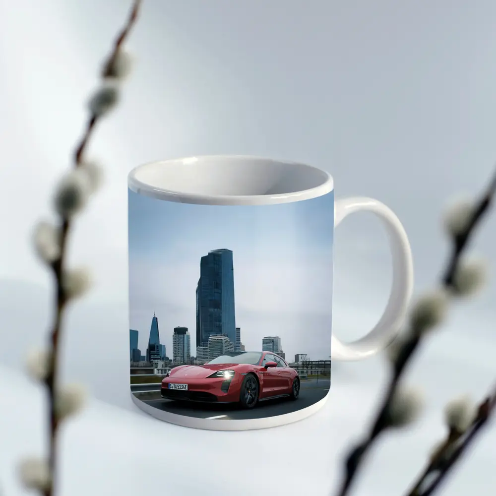 Red Porsche Taycan Driving Through City Skyline – Mugs