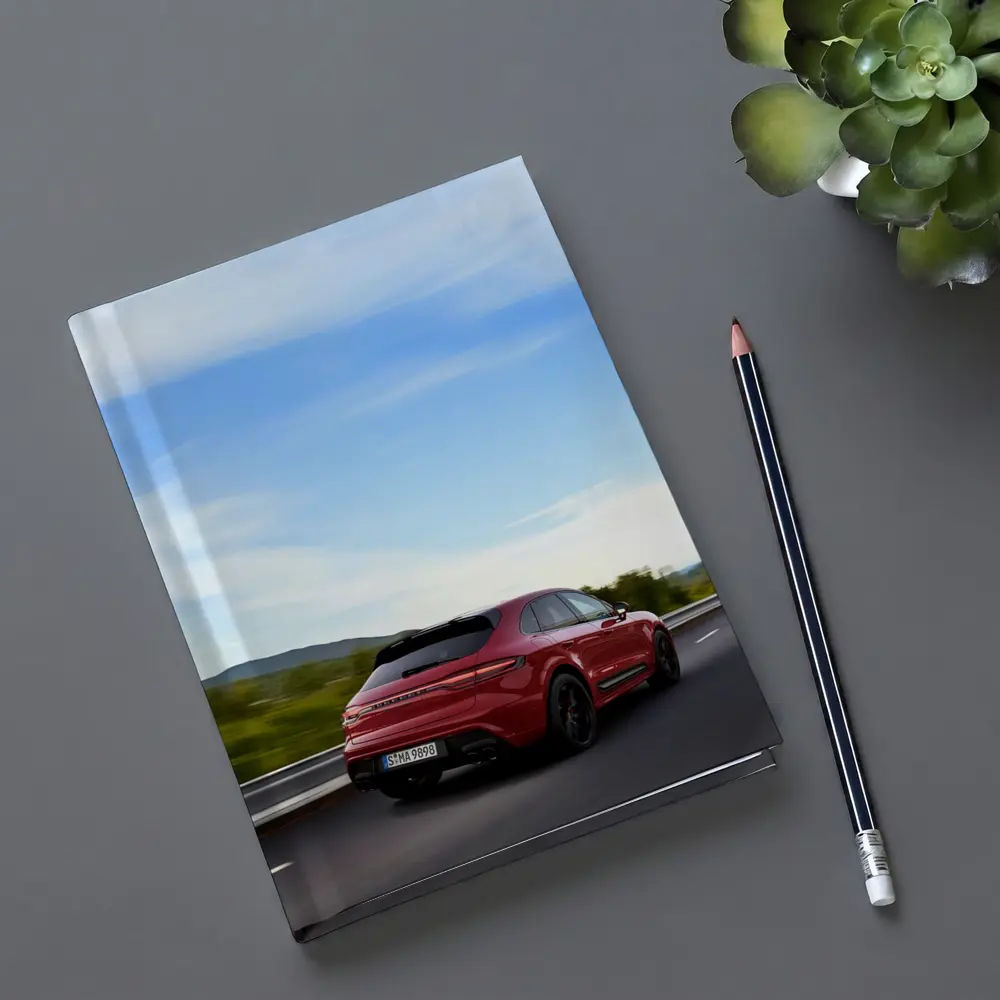 Red Porsche Cayenne Speeding On Open Road – Notebooks