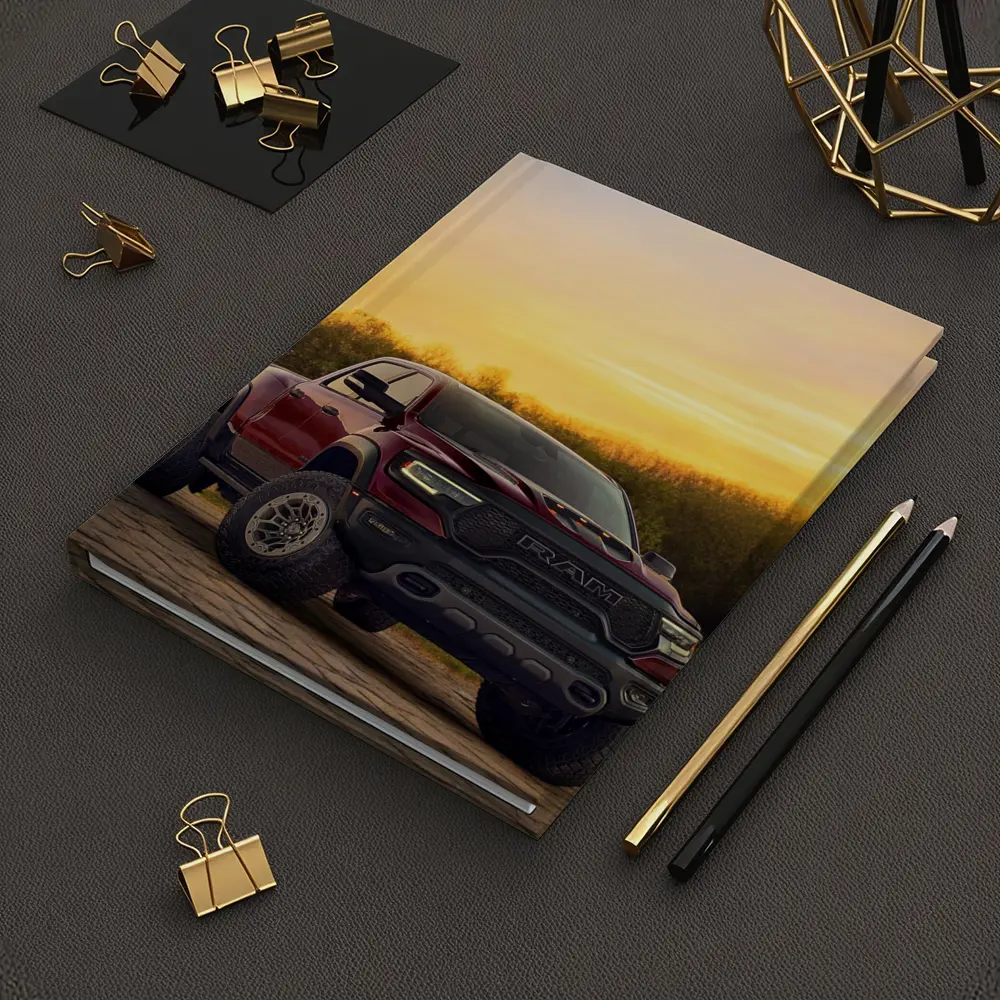 Ram Truck Parked Against Golden Sunset Sky – Notebooks