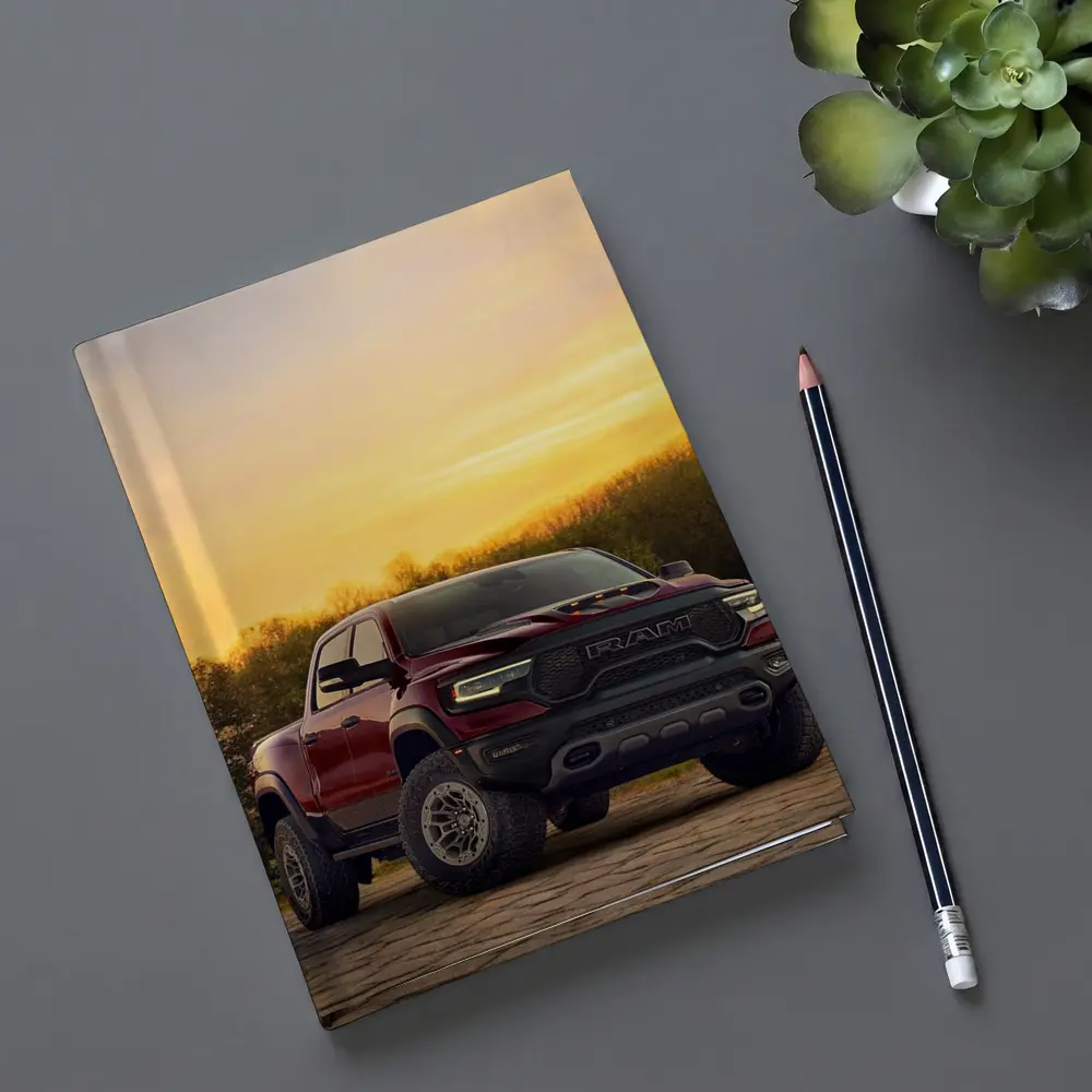 Ram Truck Parked Against Golden Sunset Sky – Notebooks