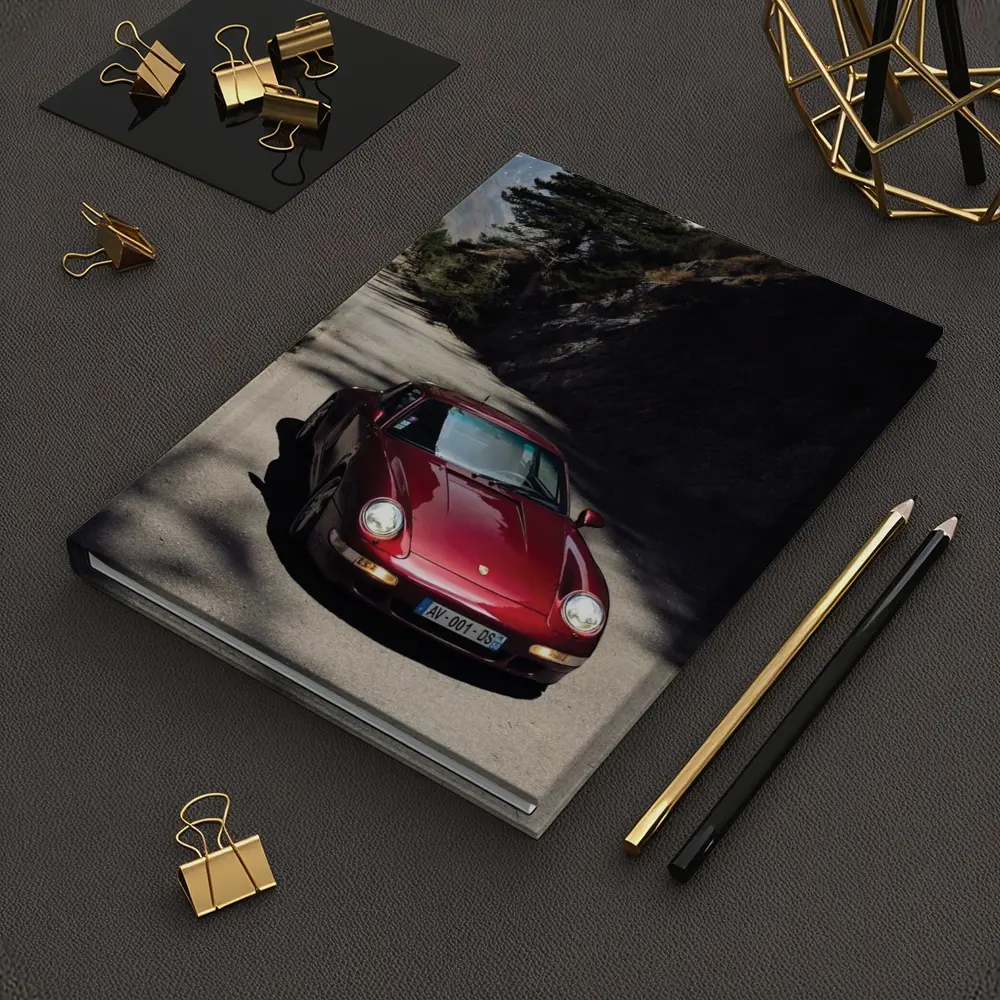 Red Porsche 911 On Alpine Mountain Road – Notebooks