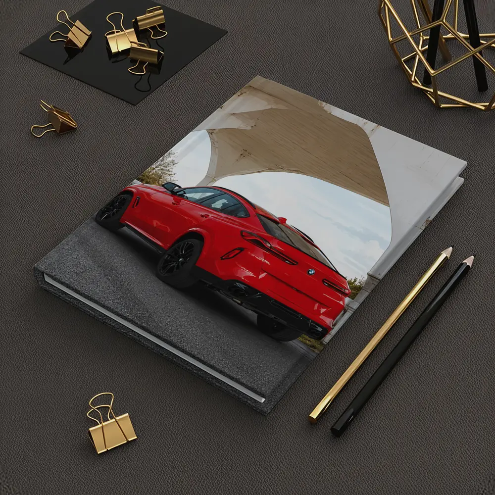 Red BMW X6M Under Concrete Bridge – Notebooks