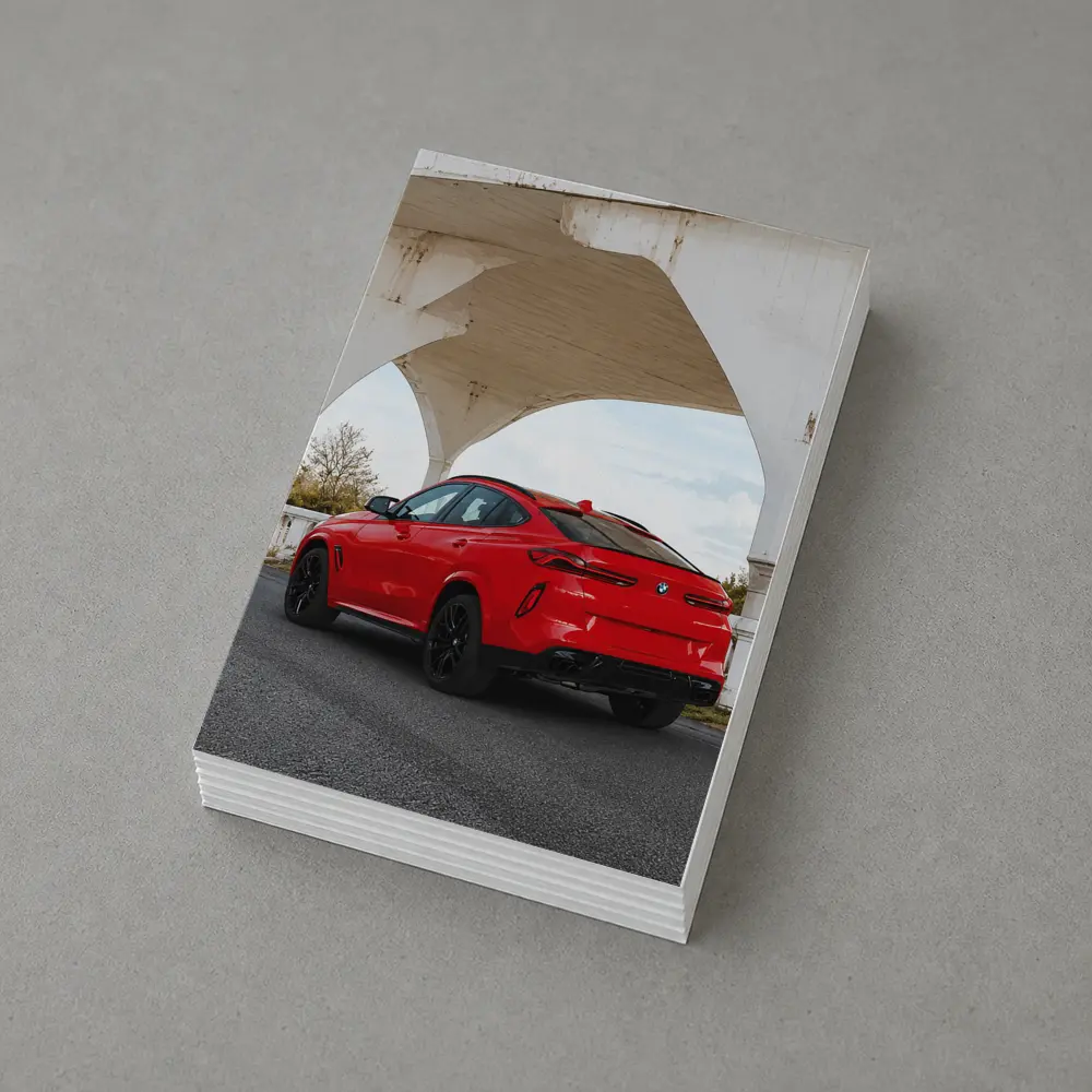 Red BMW X6M Under Concrete Bridge – Postcards