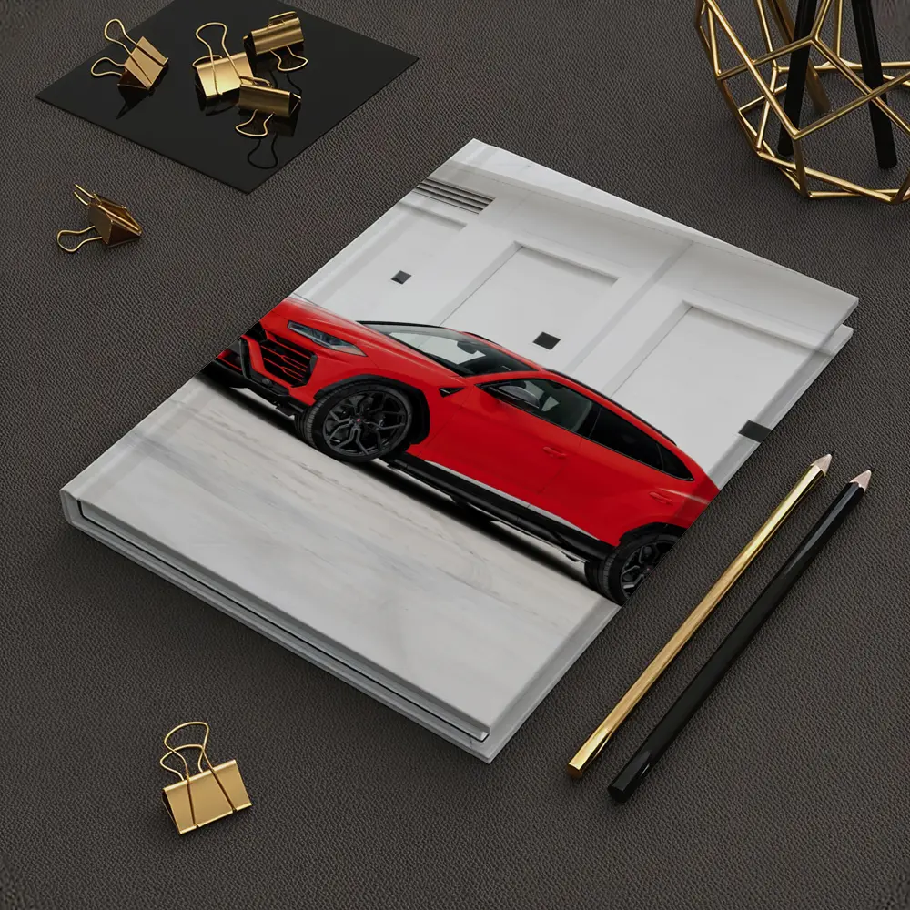 Red Lamborghini Urus Parked Outside Garage – Notebooks