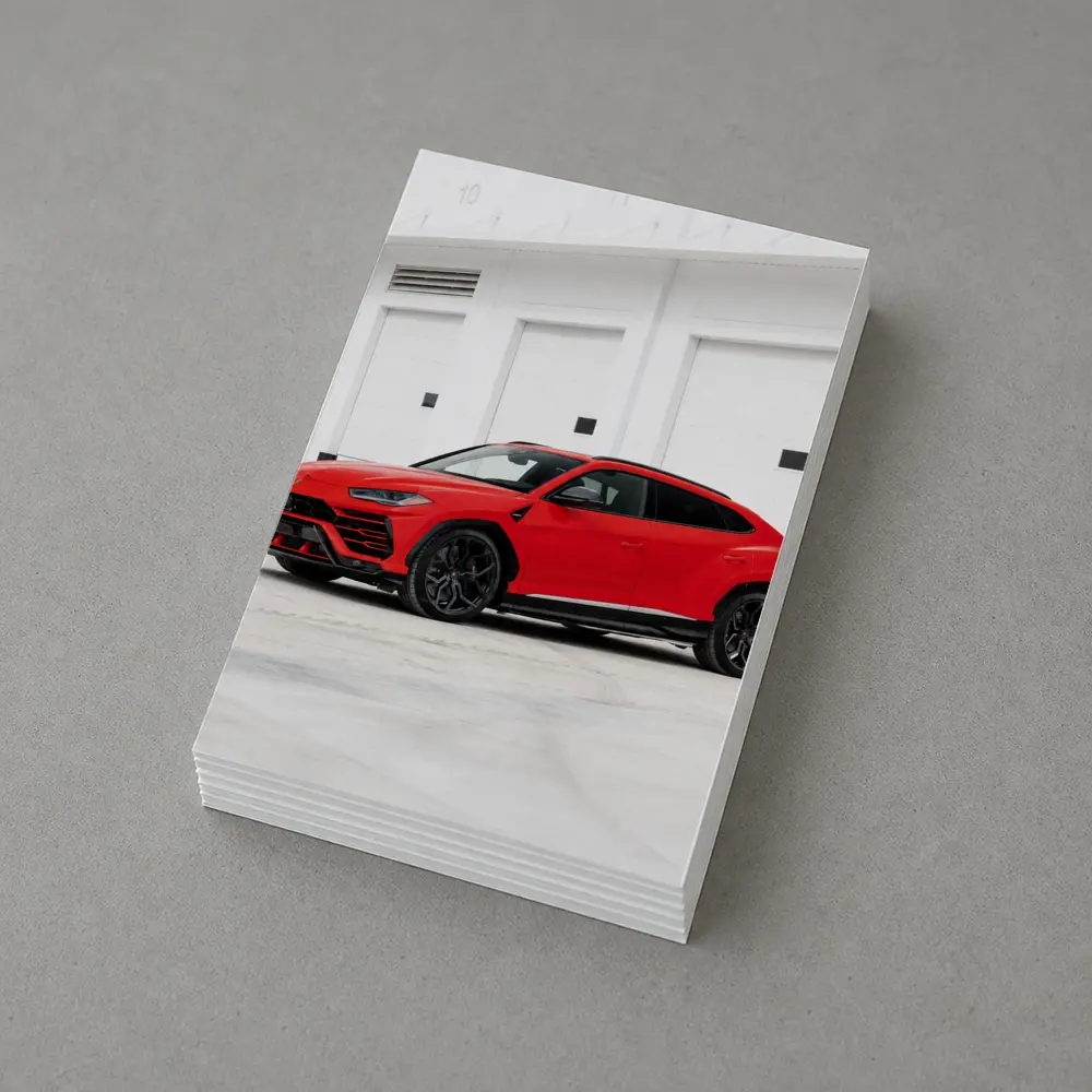 Red Lamborghini Urus Parked Outside Garage – Postcards