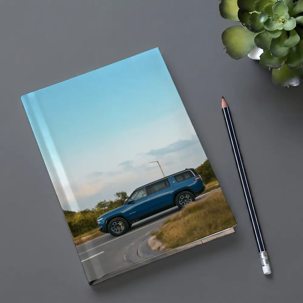Rivian R1S Blue SUV Open Road – Notebooks