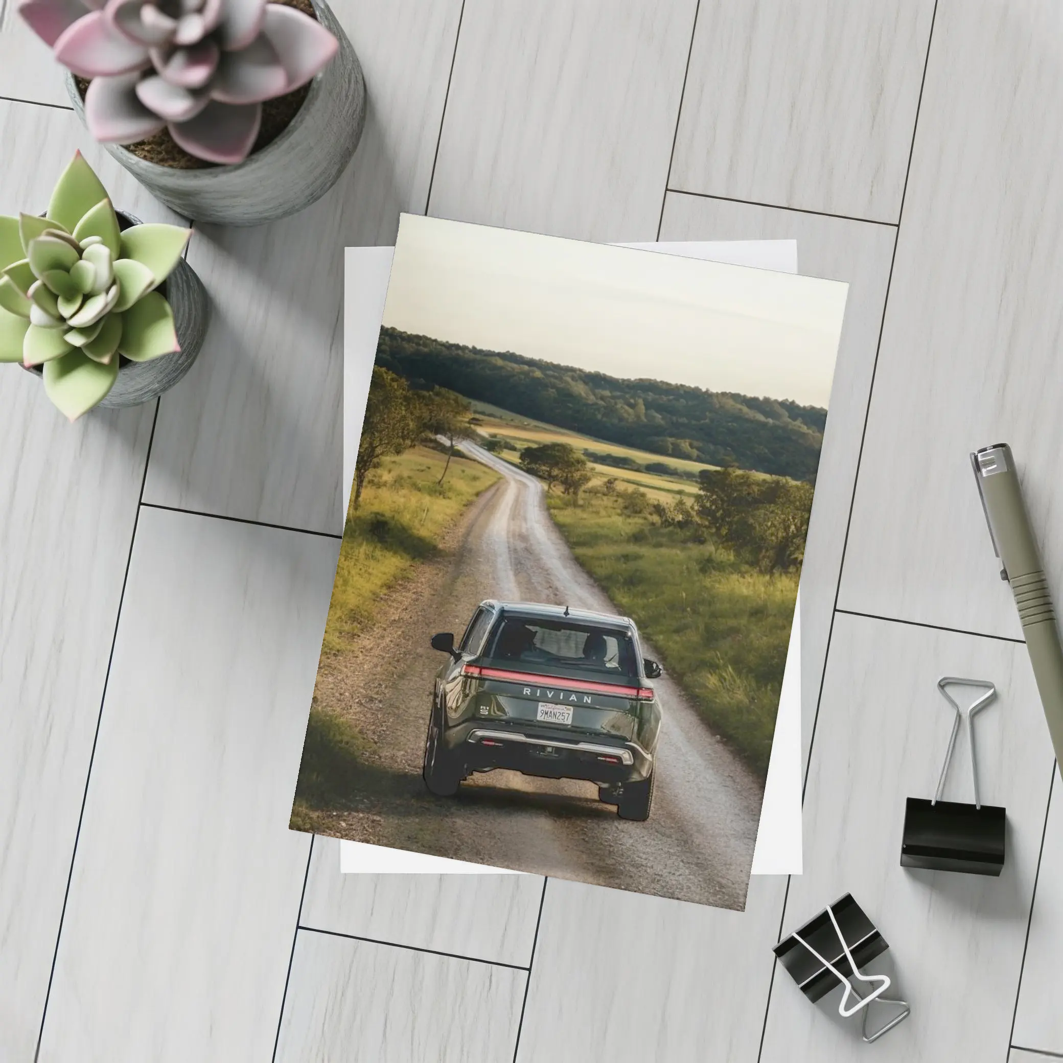Rivian R1S On Rural Country Dirt Road – Postcards
