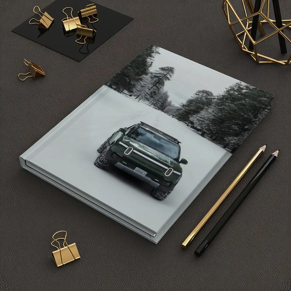 Rivian R1S Green Truck Snowy Forest Road – Notebooks