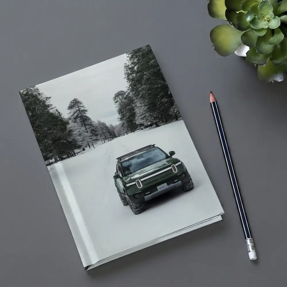 Rivian R1S Green Truck Snowy Forest Road – Notebooks