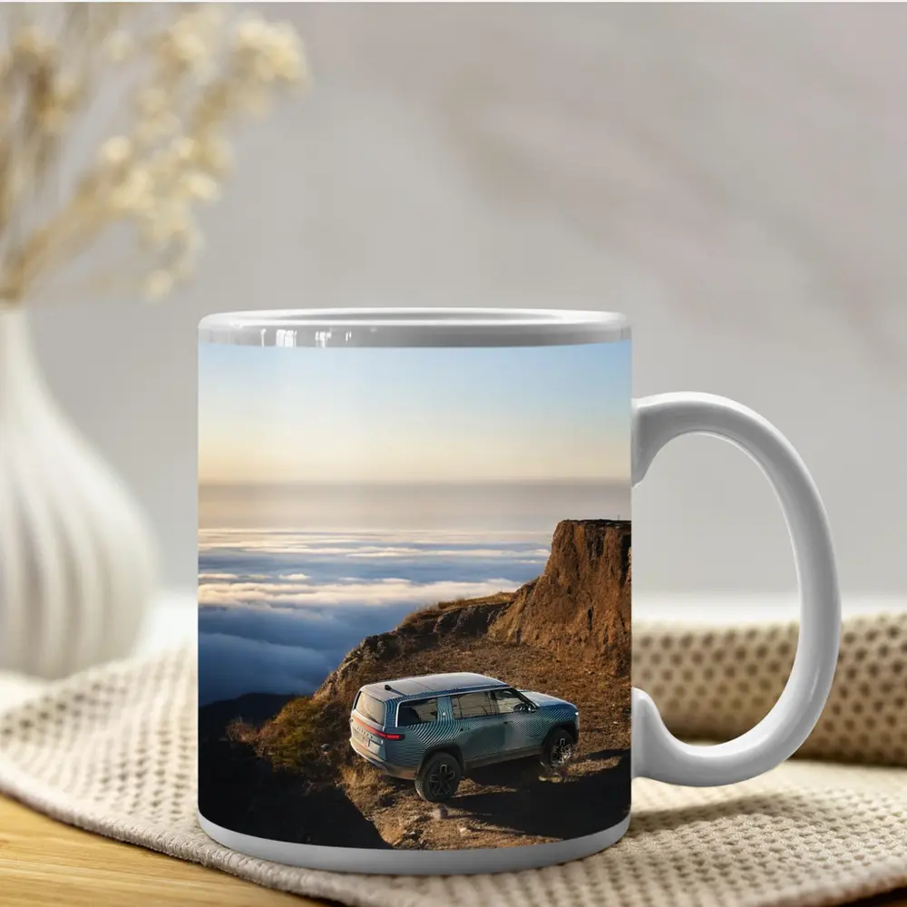 Rivian R1S SUV Above Mountain Clouds – Mugs