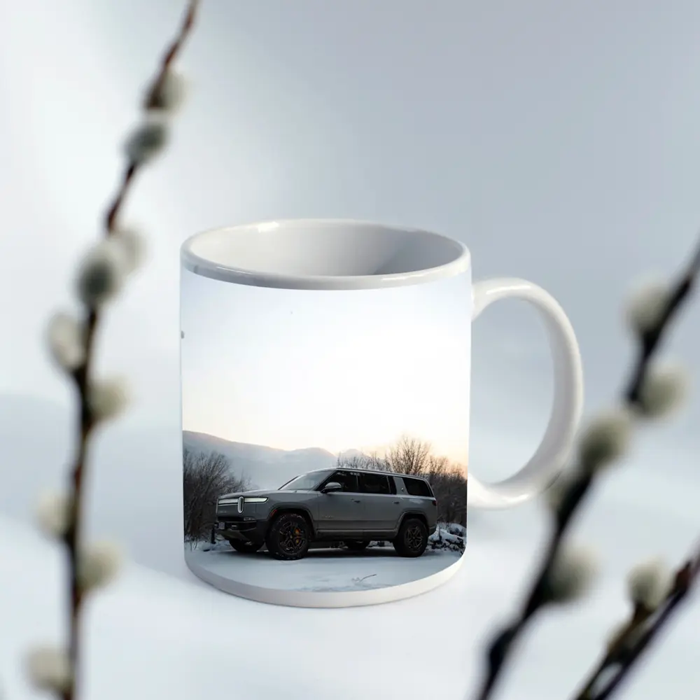 Rivian R1S SUV Parked in Winter Snow – Mugs