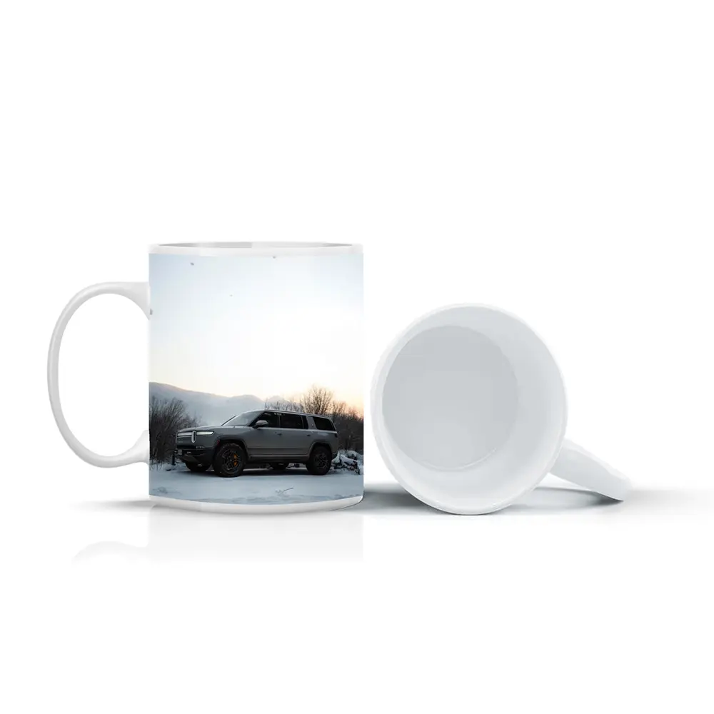 Rivian R1S SUV Parked in Winter Snow – Mugs