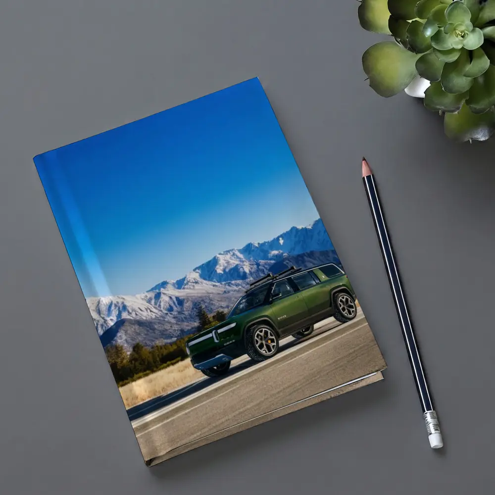 Rivian R1S Green SUV Snowy Mountains – Notebooks