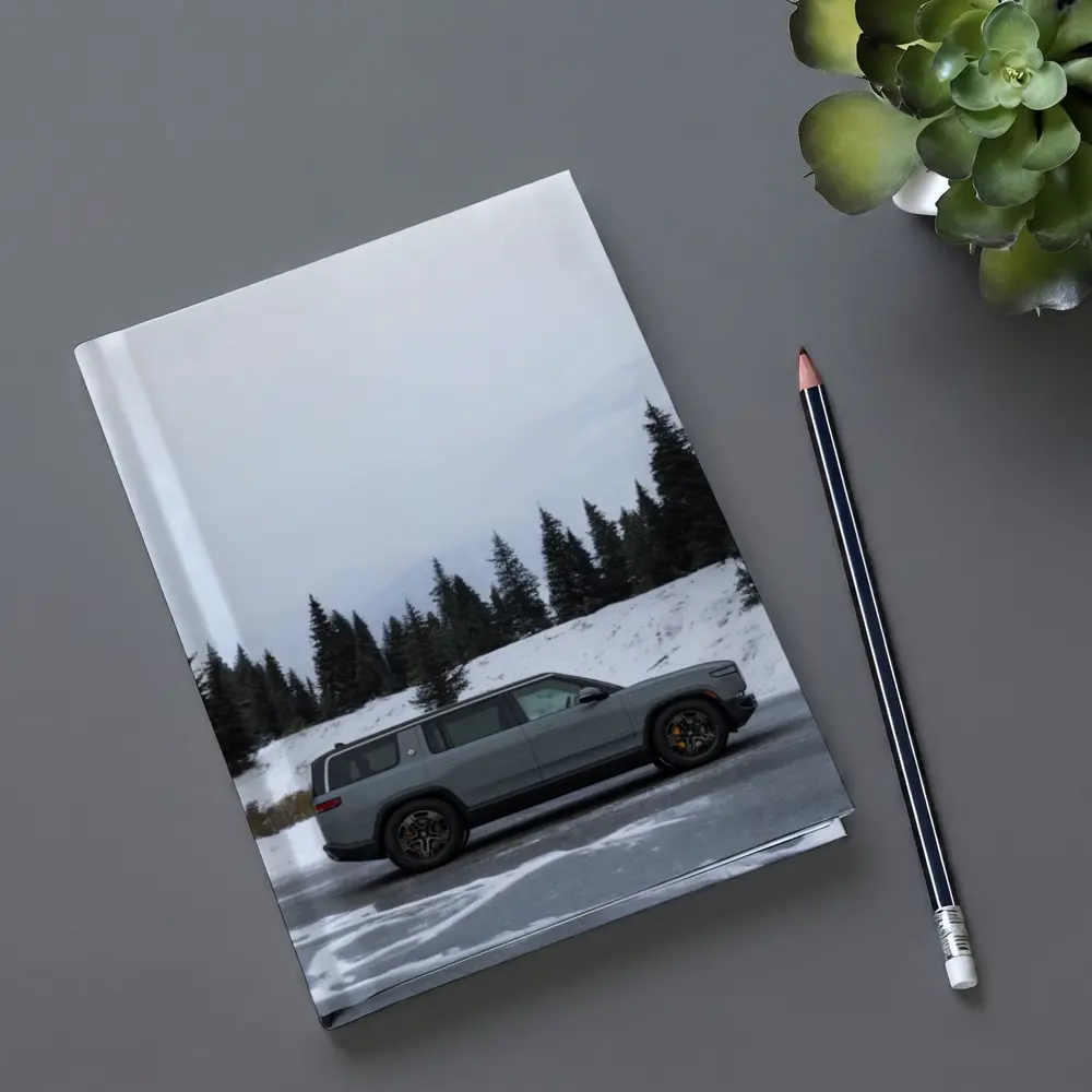 Rivian R1S Gray SUV Snowy Mountain Forest – Notebooks