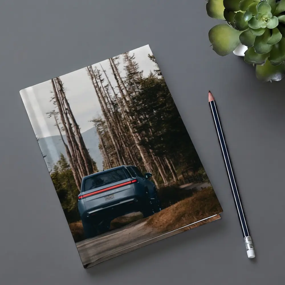 Rivian R1S SUV Winding Forest Mountain Road – Notebooks