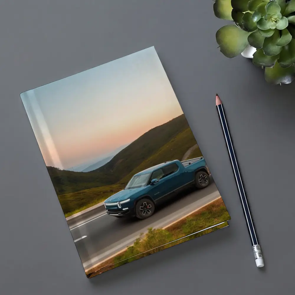 Rivian R1T Truck Rolling Through Mountain Valley – Notebooks