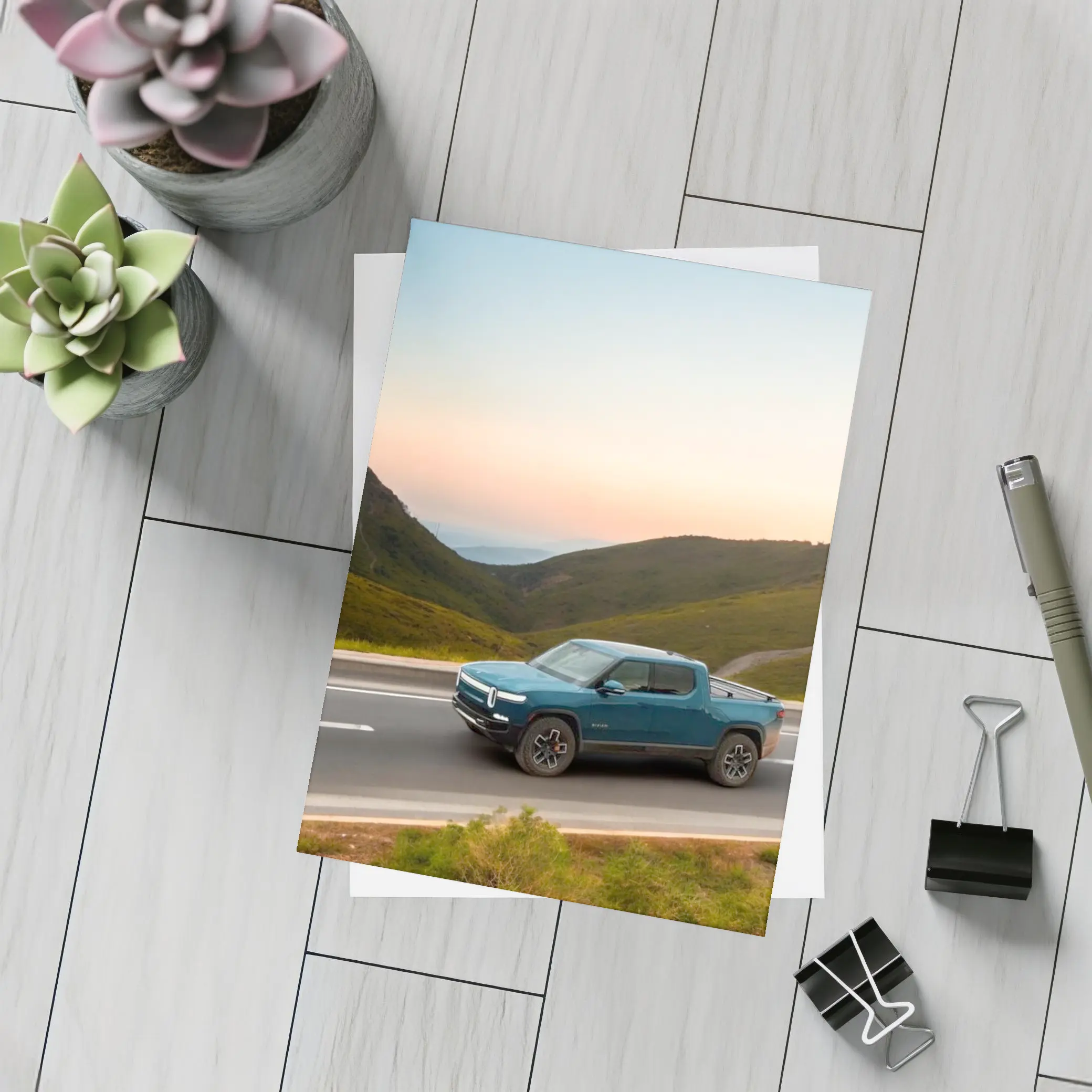 Rivian R1T Truck Rolling Through Mountain Valley – Postcards