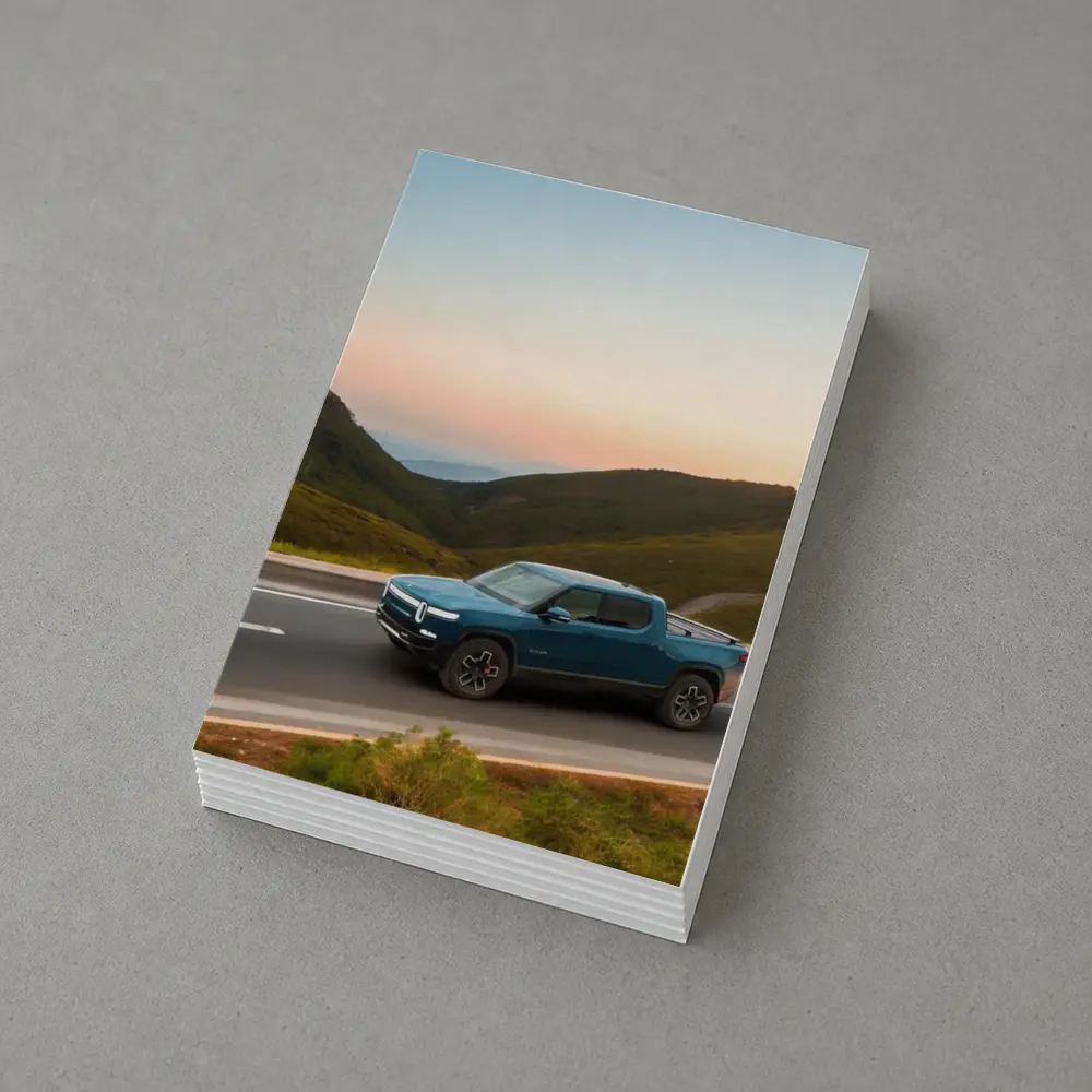 Rivian R1T Truck Rolling Through Mountain Valley – Postcards