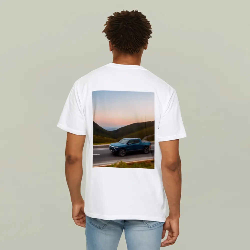 Rivian R1T Truck Rolling Through Mountain Valley – T-Shirts