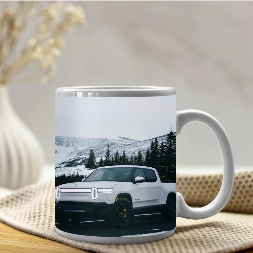 Rivian R1T White Truck Snowy Mountain Road – Mugs