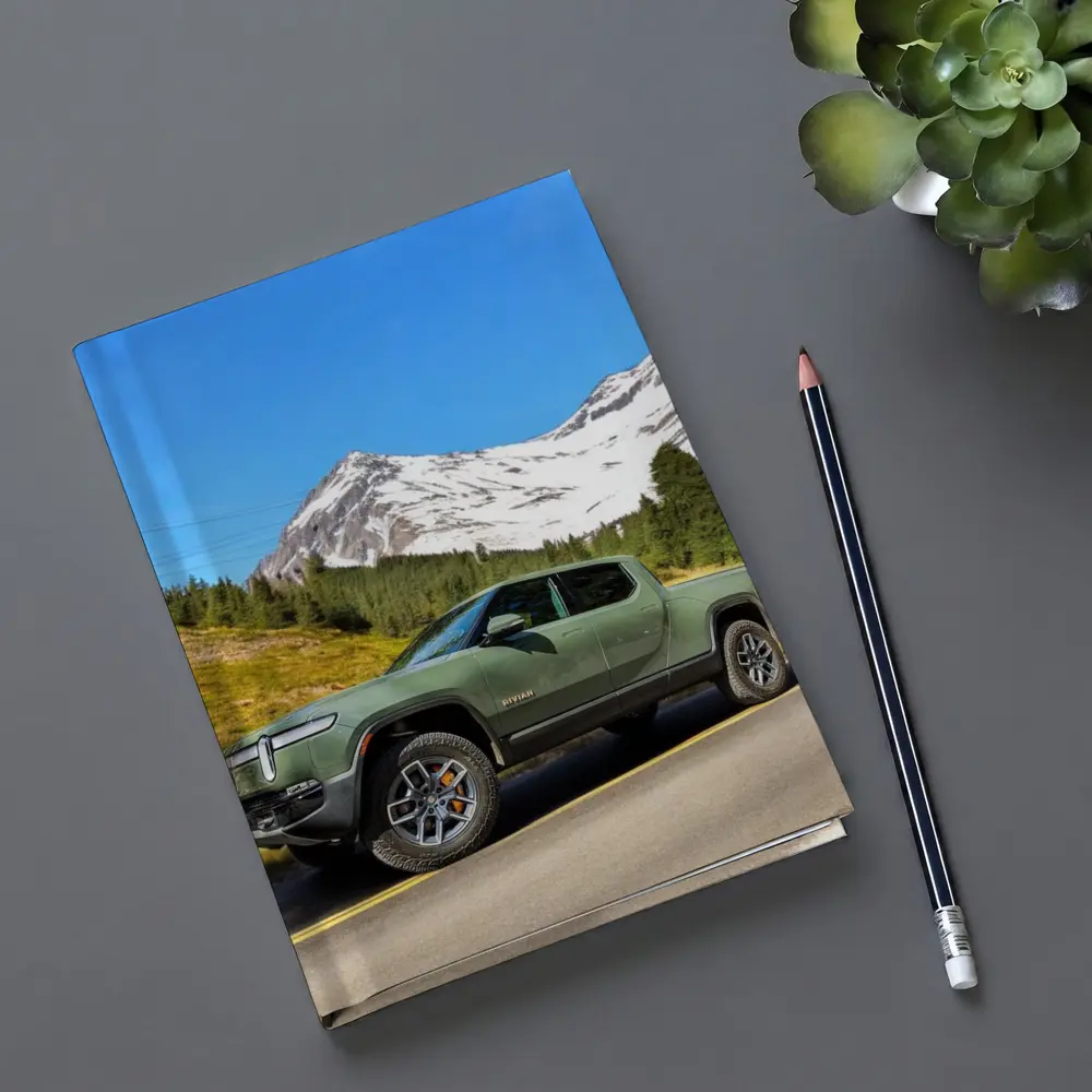 Rivian R1T Green Truck Snowy Mountain Road – Notebooks