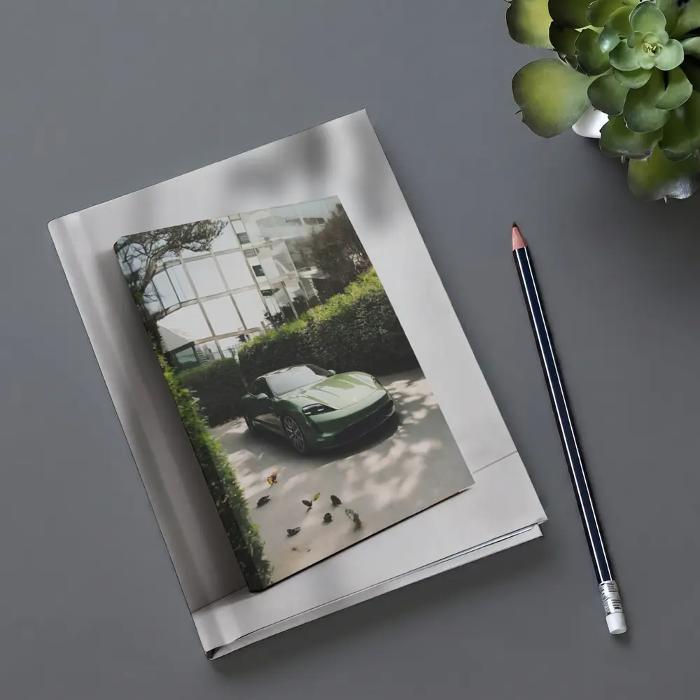 Green Porsche Taycan Parked By Glass Building – Notebooks
