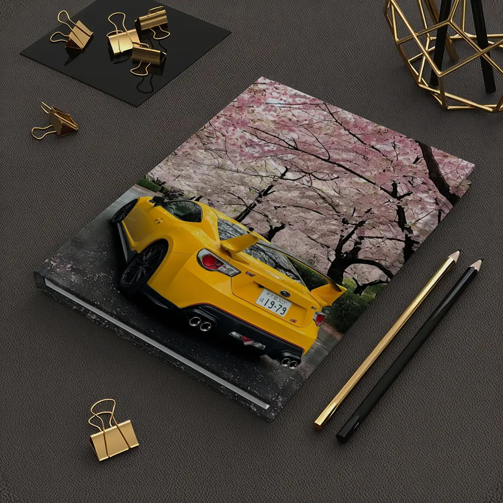 Yellow Subaru BRZ Under Cherry Blossoms – Notebooks