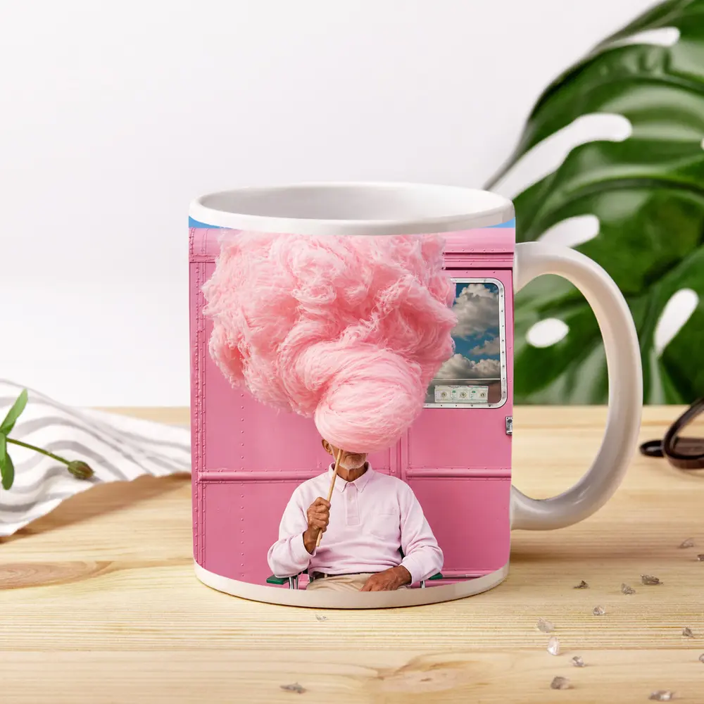 Man Holding Giant Pink Cotton Candy Outdoors – Mugs