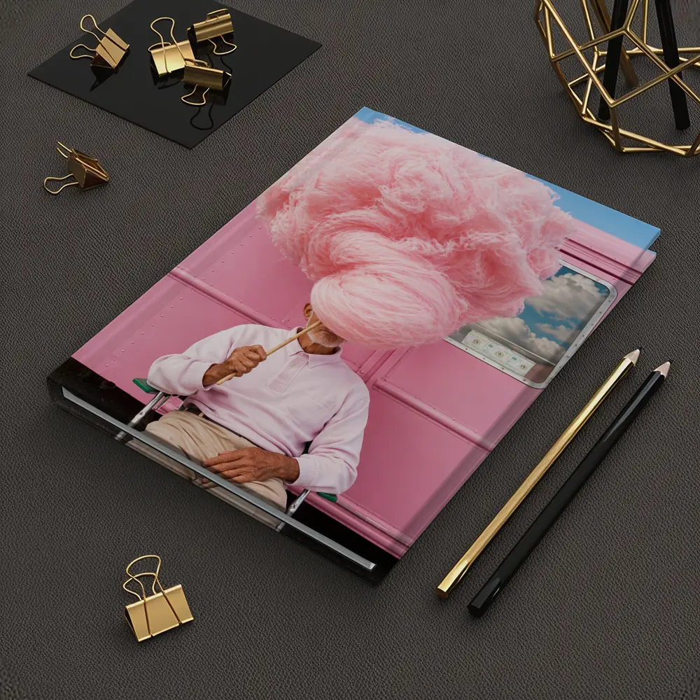 Man Holding Giant Pink Cotton Candy Outdoors – Notebooks