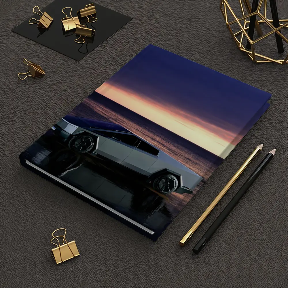 Tesla Cybertruck Parked on Beach at Sunset – Notebooks