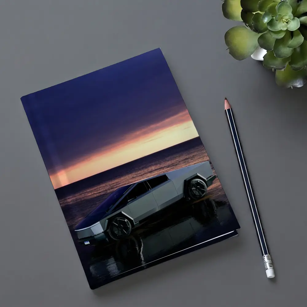 Tesla Cybertruck Parked on Beach at Sunset – Notebooks