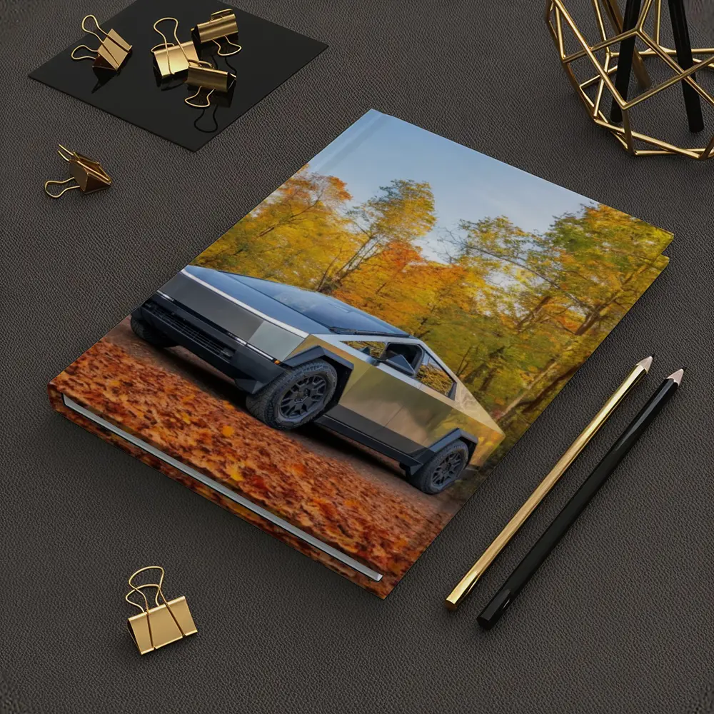 Tesla Cybertruck Parked Among Autumn Trees – Notebooks