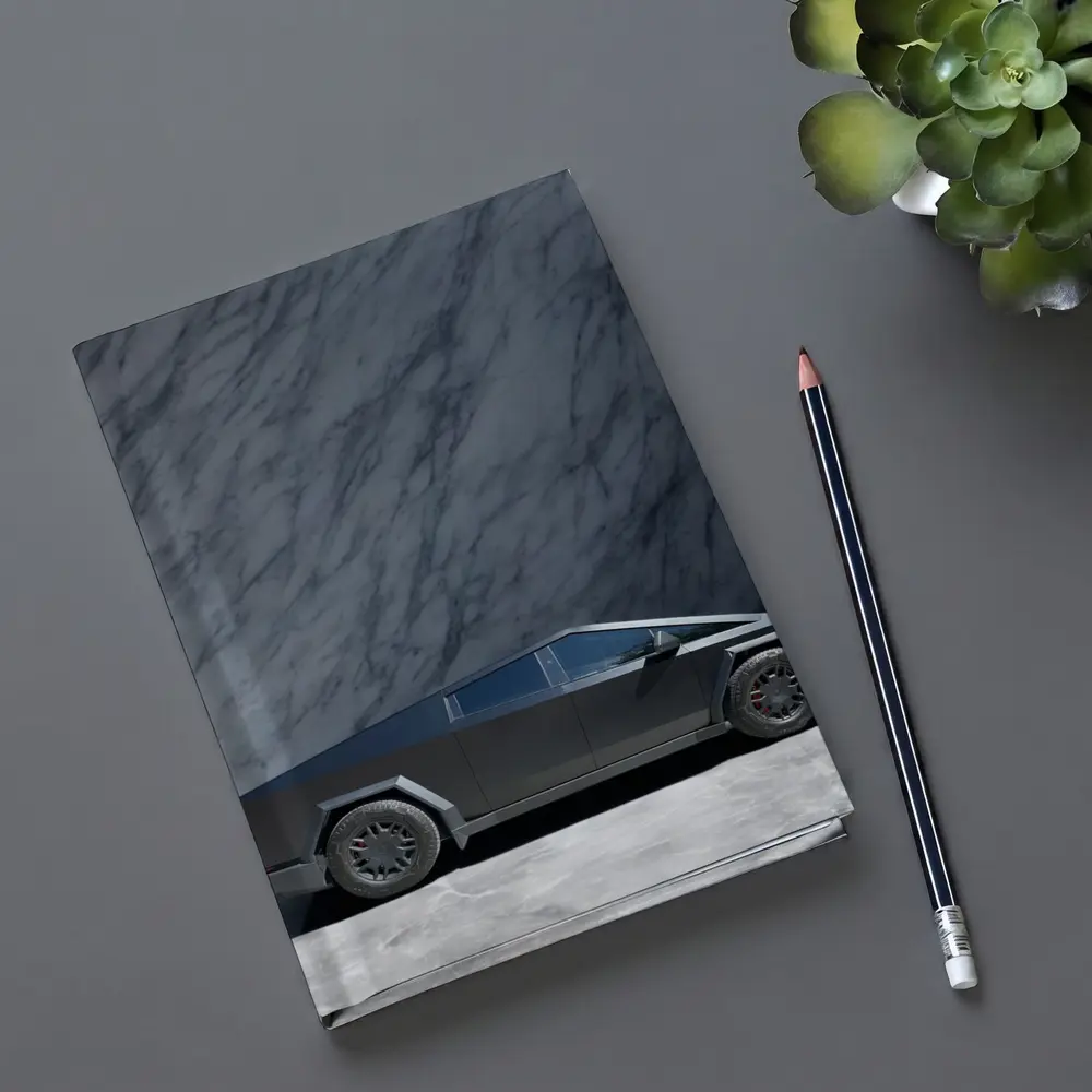Tesla Cybertruck Against Marble Stone Wall – Notebooks