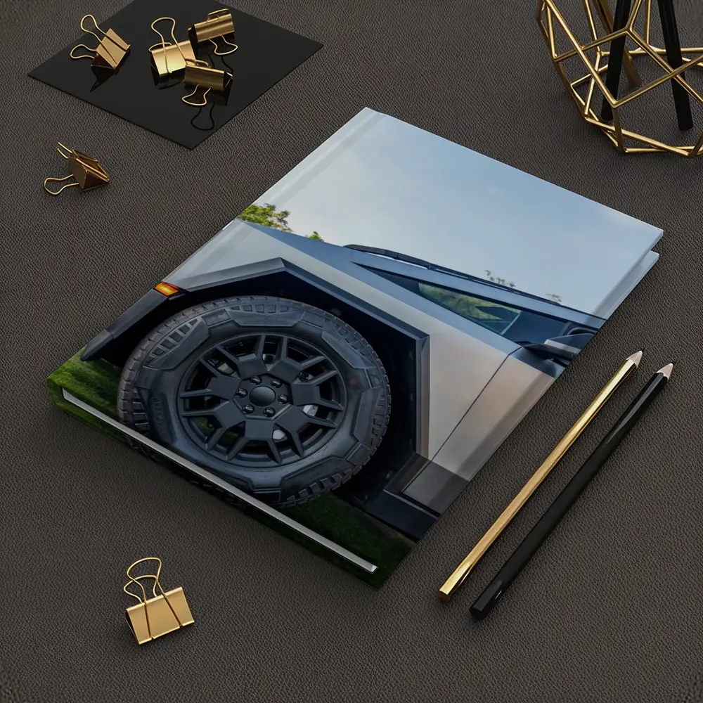 Tesla Cybertruck Parked On Green Grass – Notebooks